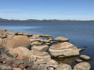 Rocks at calm lake — Wichita Mountains
